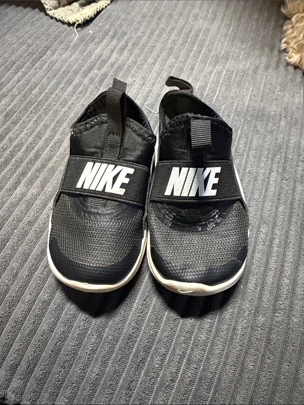 Nike Black Kids Slip-On Sneakers with White Logo